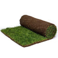 A roll of green turf or natural grass lawn 