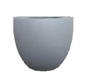 Matte grey round ceramic planter pot on white background